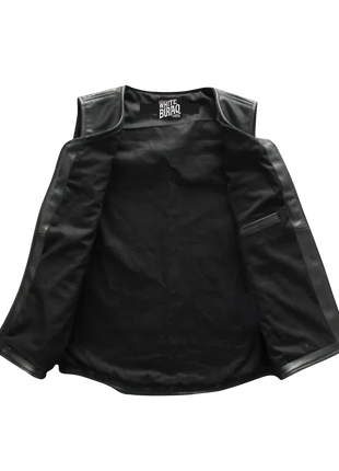 Black sleeveless jacket with leather accents 