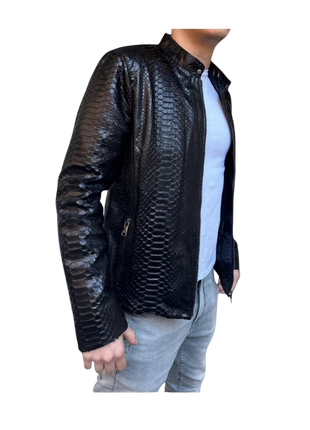 Black textured leather jacket worn by a person 