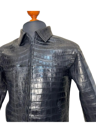 Black crocodile skin jacket on a mannequin 