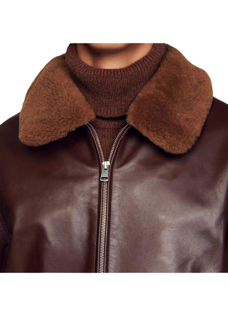 Brown leather jacket with a fur collar 