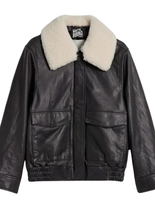 Black leather jacket with white fur collar 