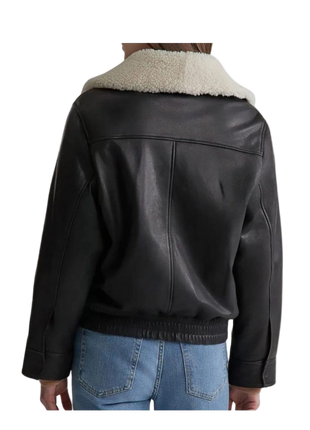 Black leather jacket with white fur collar