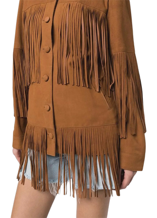 Brown suede fringe jacket worn with denim shorts 
