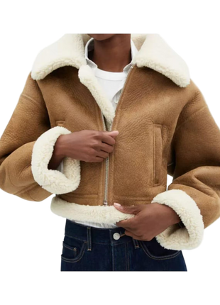 Brown jacket with white fur lining