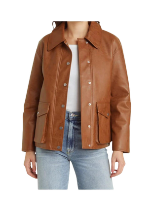 Brown leather jacket worn by a person 