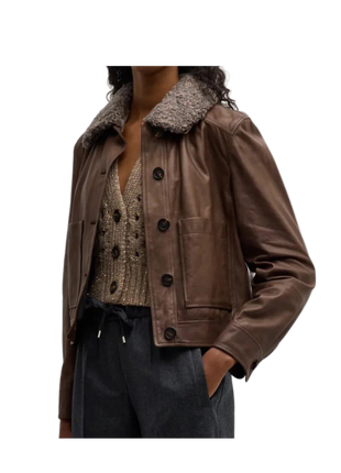 Black leather jacket with white fur lining 