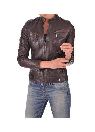Person wearing a brown leather jacket and blue jeans 